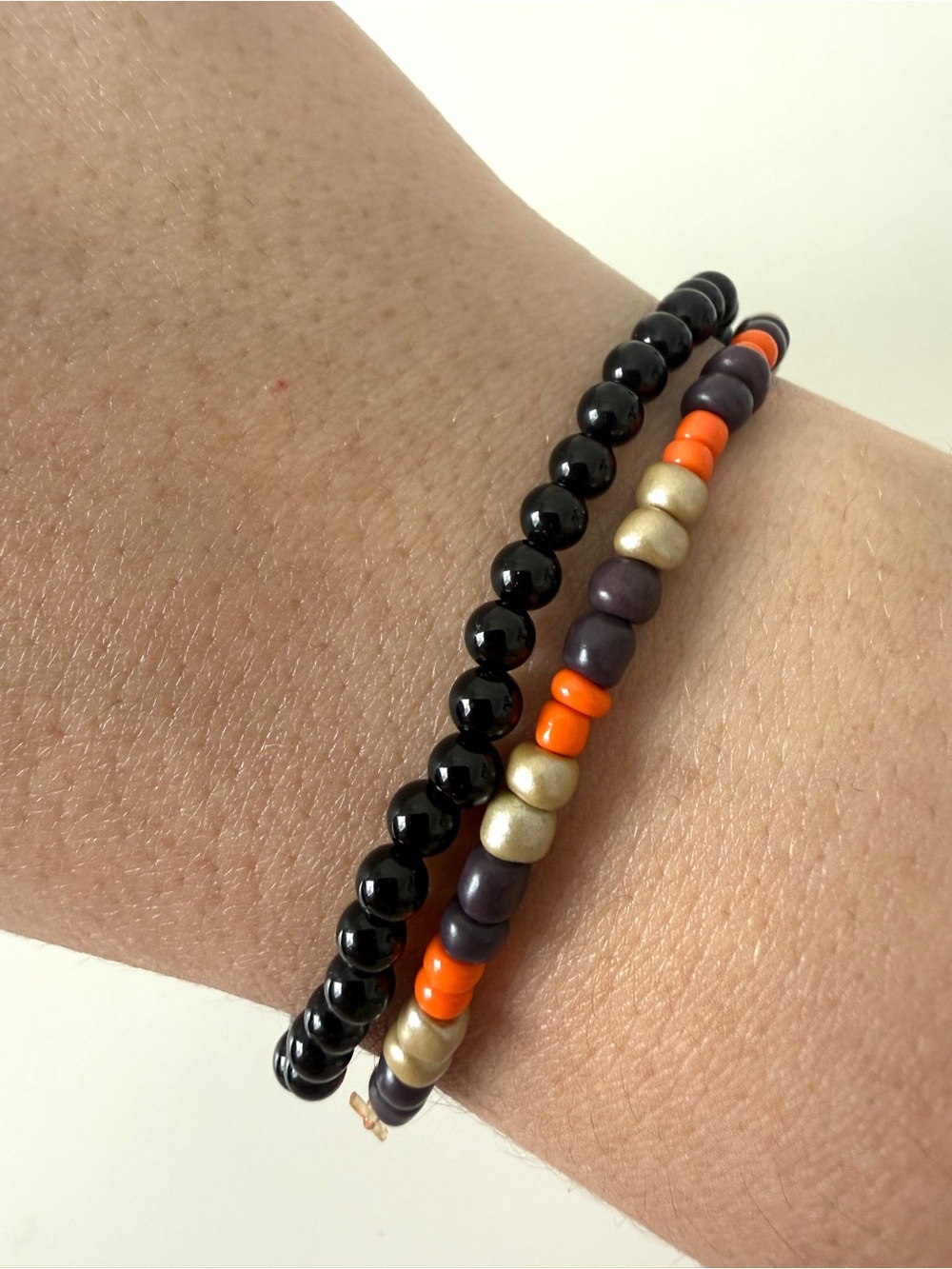 Beaded Stack Bracelet Set in Black, Orange, Purple & Gold